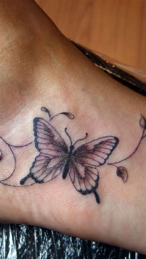 tattoos on the side of the foot|meaningful butterfly tattoo on foot.